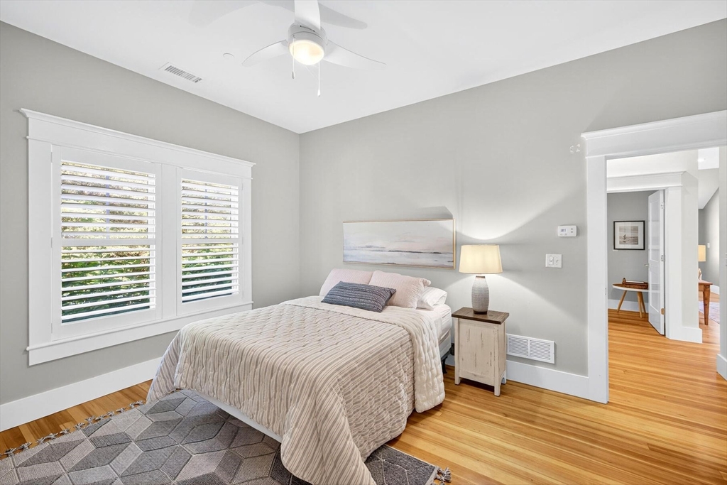 950 Massasoit Road, Unit 3 Eastham, MA 02642 - Photo 40 of 42 a bedroom with double bed and a window