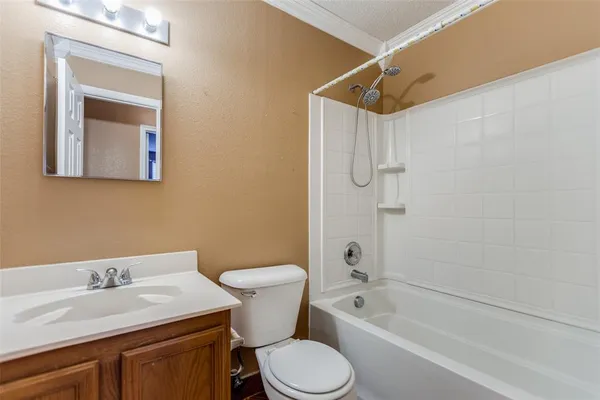 a bathroom with a sink a toilet and a bathtub