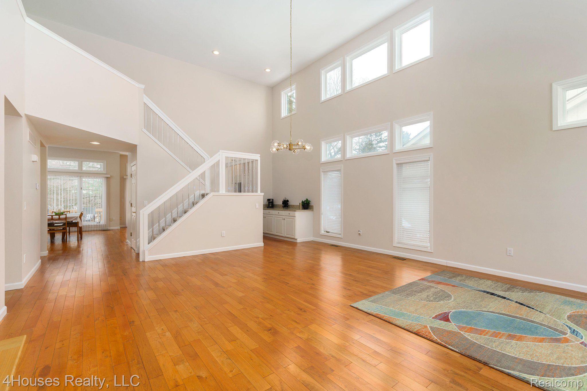 30658 Maplewood Circle Farmington, MI 48331 - Photo 14 of 50 Living Room - Stairway to 2nd Floor