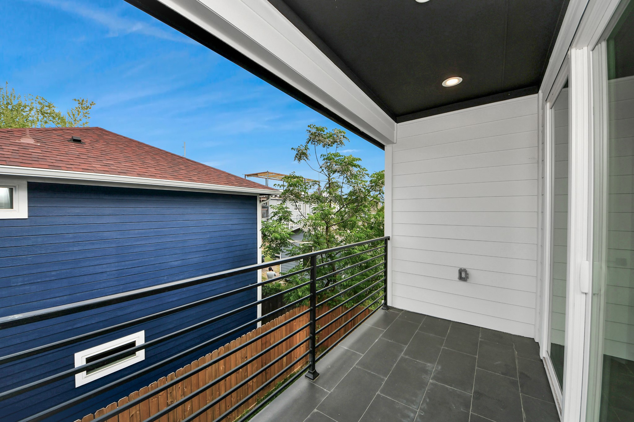 505 Middle Street Houston, TX 77003 - Photo 24 of 46 Enjoy serene mornings and peaceful sunsets from your private balcony in the primary bedroom, offering a perfect blend of comfort and outdoor tranquility.