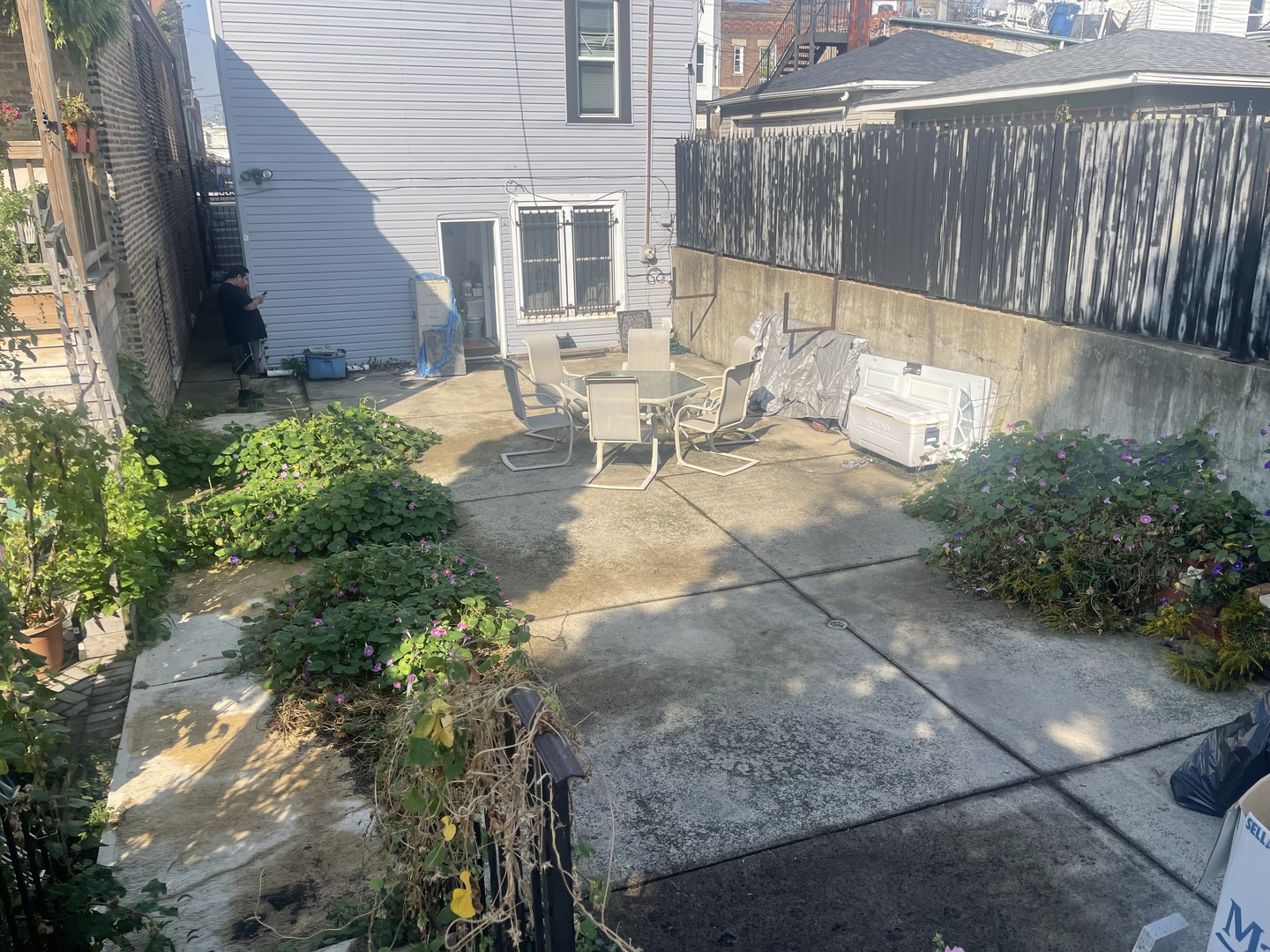 2213 South Oakley Avenue Chicago, IL 60608 - Photo 26 of 27 a view of backyard with outdoor seating and plants