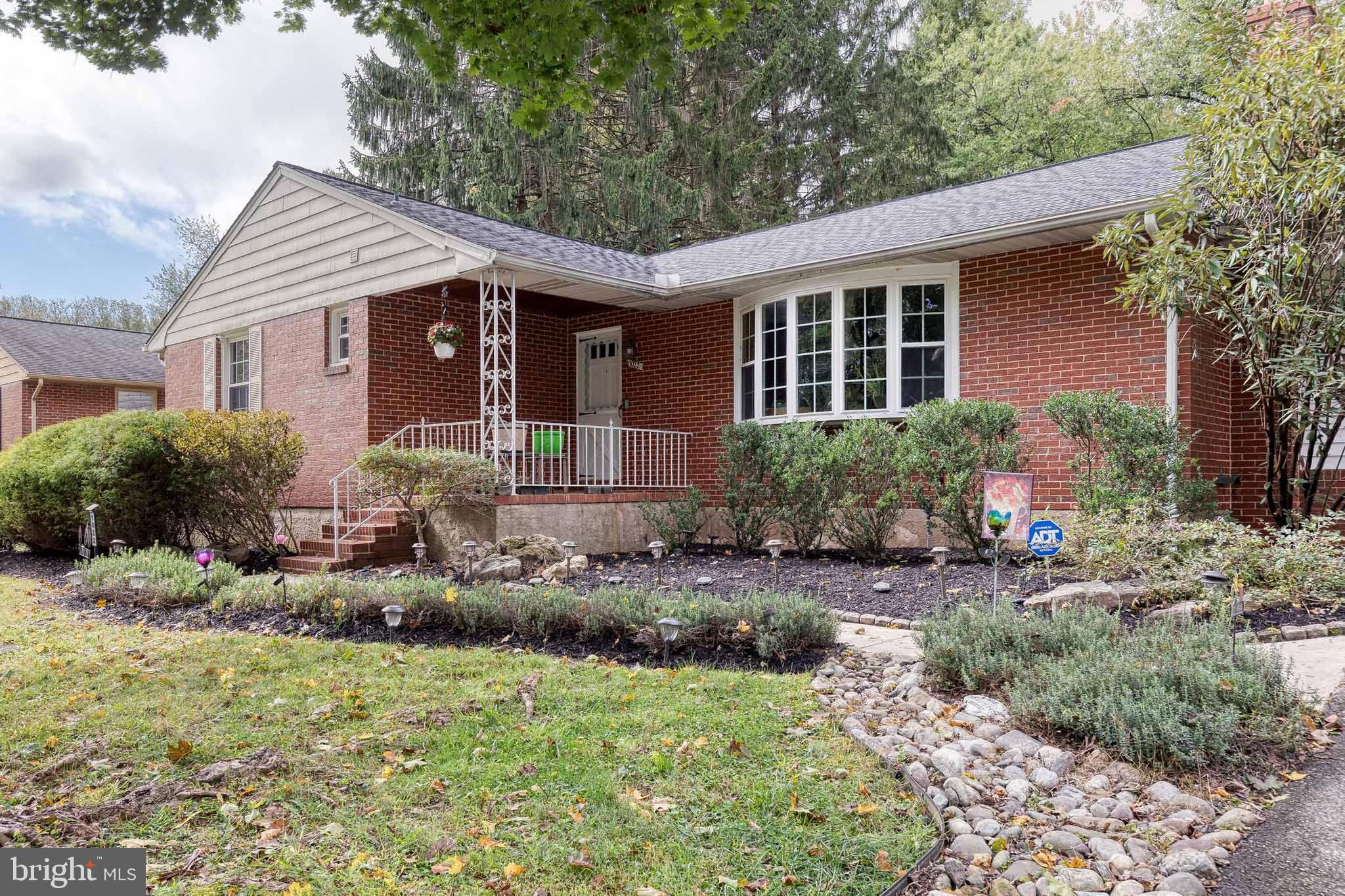 1022 Roxleigh Road Towson, MD 21286 - Photo 3 of 36 a front view of a house with garden