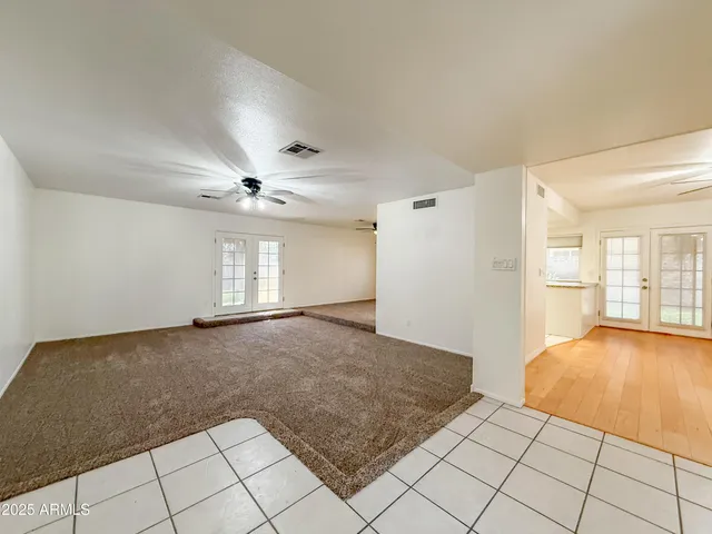 a view of an empty room and window