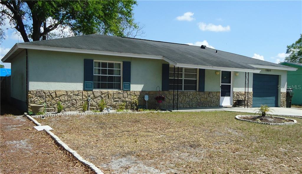 1301 Baranova Road Ocoee, FL 34761 - Photo 1 of 1 Front elevation with rock accent and fresh colors.