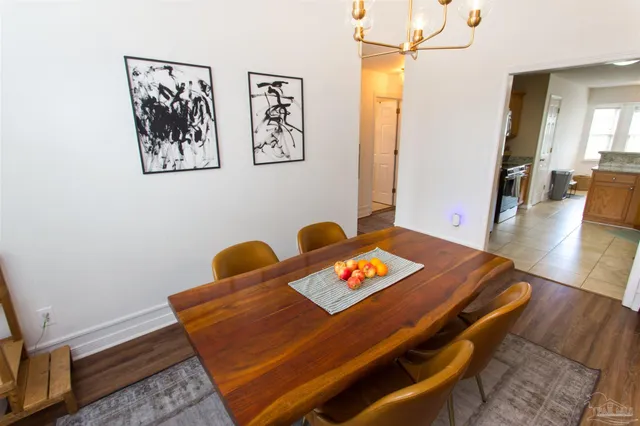 a room with furniture and wooden floor