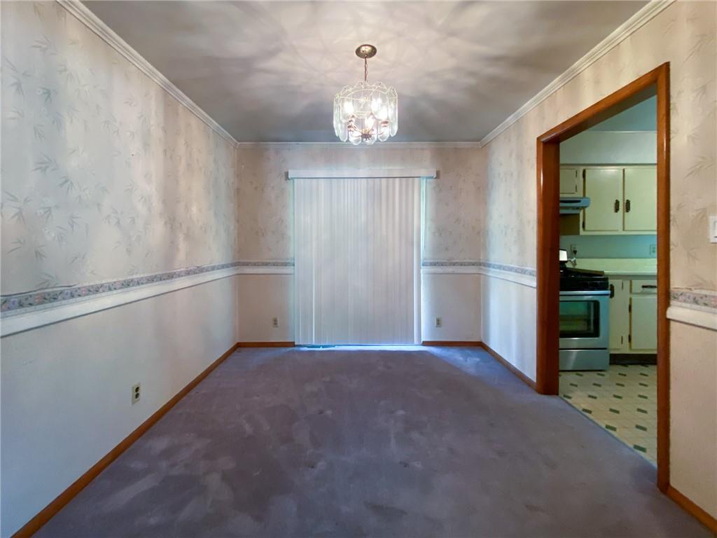 128 Clover Drive Monaca, PA 15061 - Photo 8 of 19 an empty room with closet and windows
