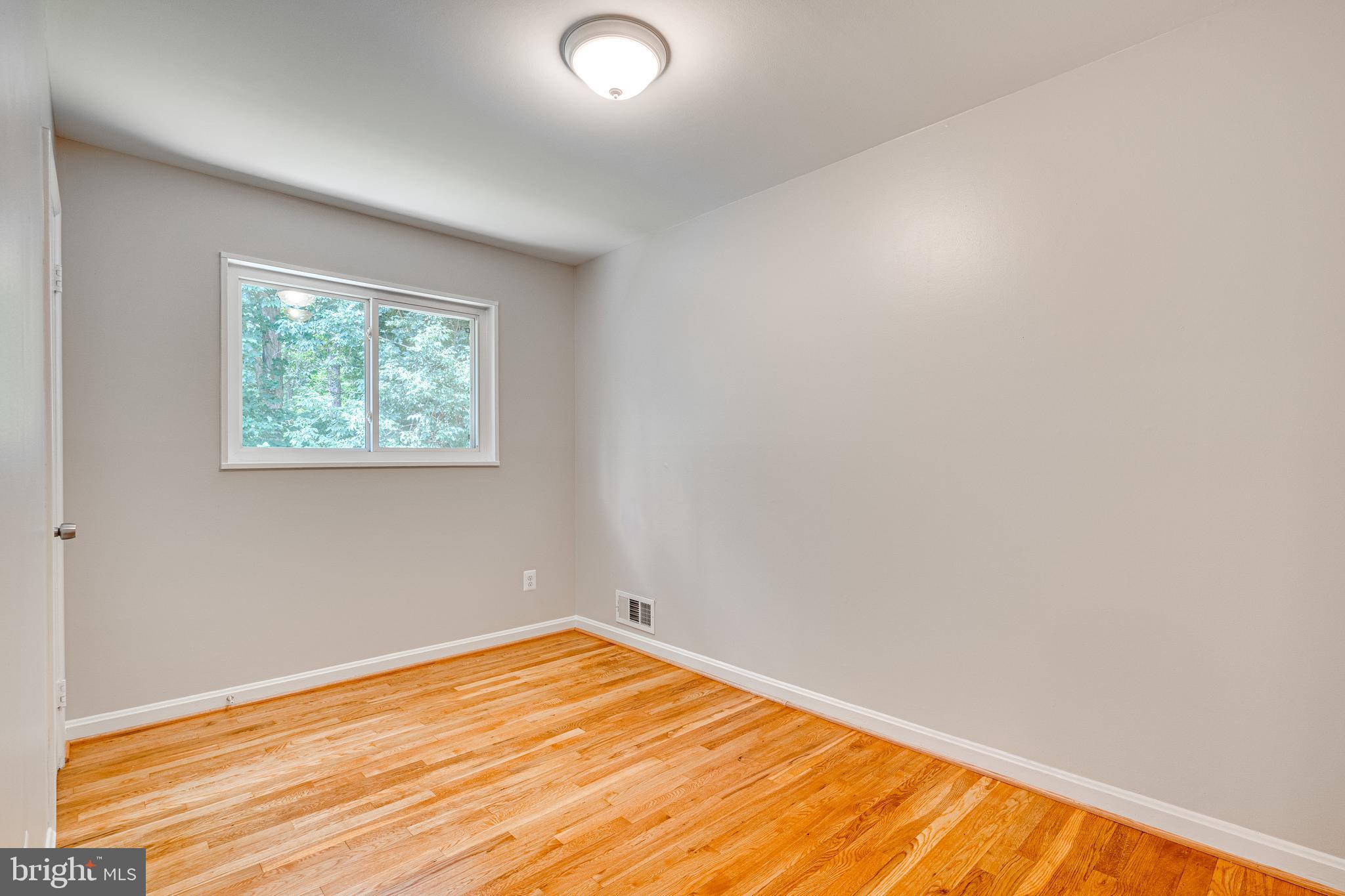 3919 Littleton Street Silver Spring, MD 20906 - Photo 17 of 32 Bedroom #2 New Lighting - Hardwood Floors