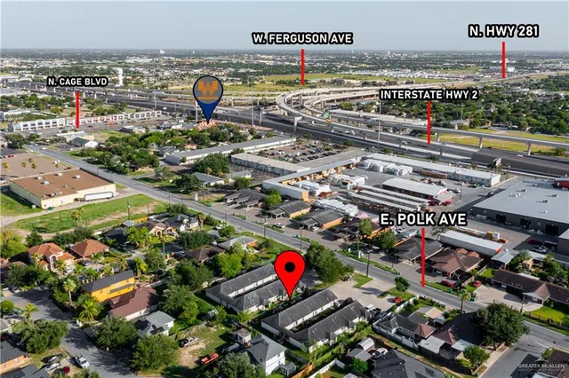 an aerial view of tennis pool patio and outdoor seating