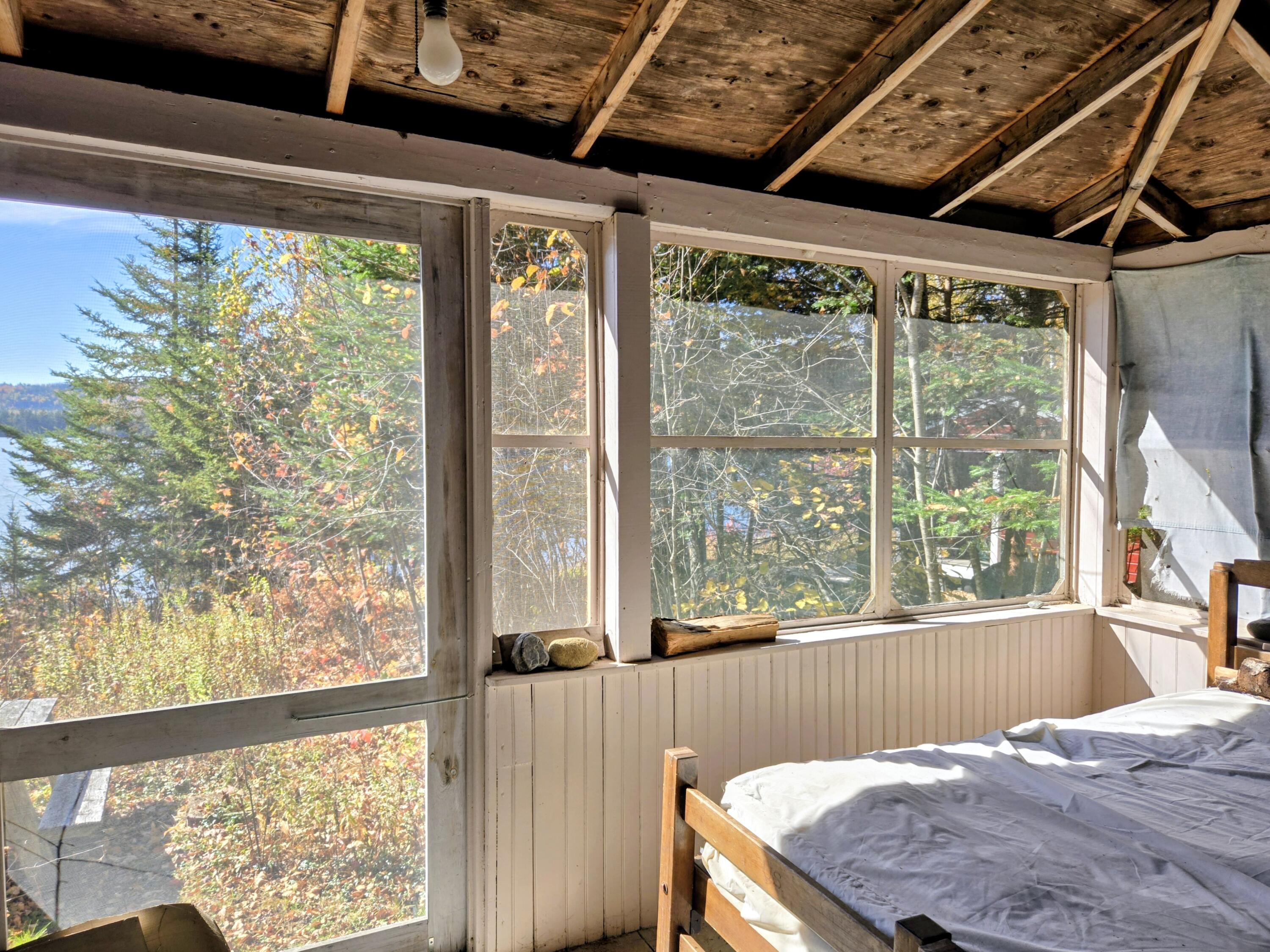 252 Quimby Pond Road Rangeley, ME 04970 - Photo 27 of 47 Screened Porched Overlooking Quimby Pond