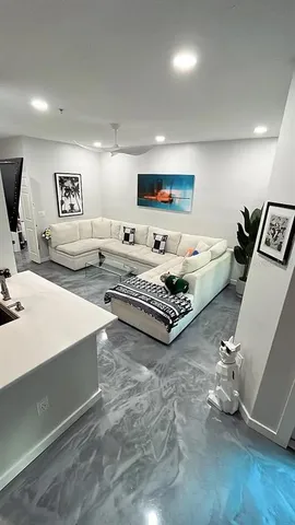 a spacious bathroom with a double vanity sink and a mirror