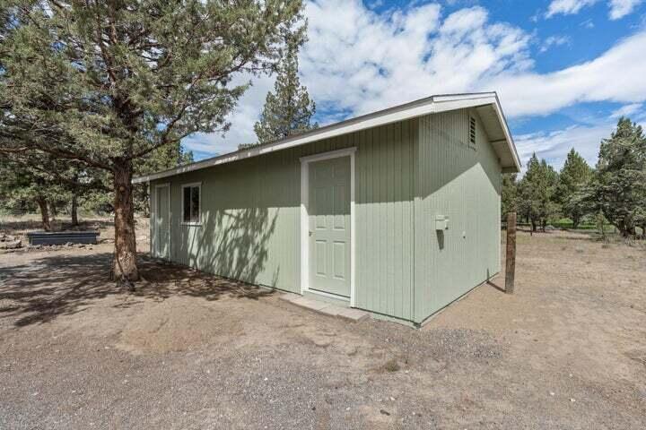 64945 McGrath Road Bend, OR 97701 - Photo 21 of 22 Large workshop to do projects, and have extra storage