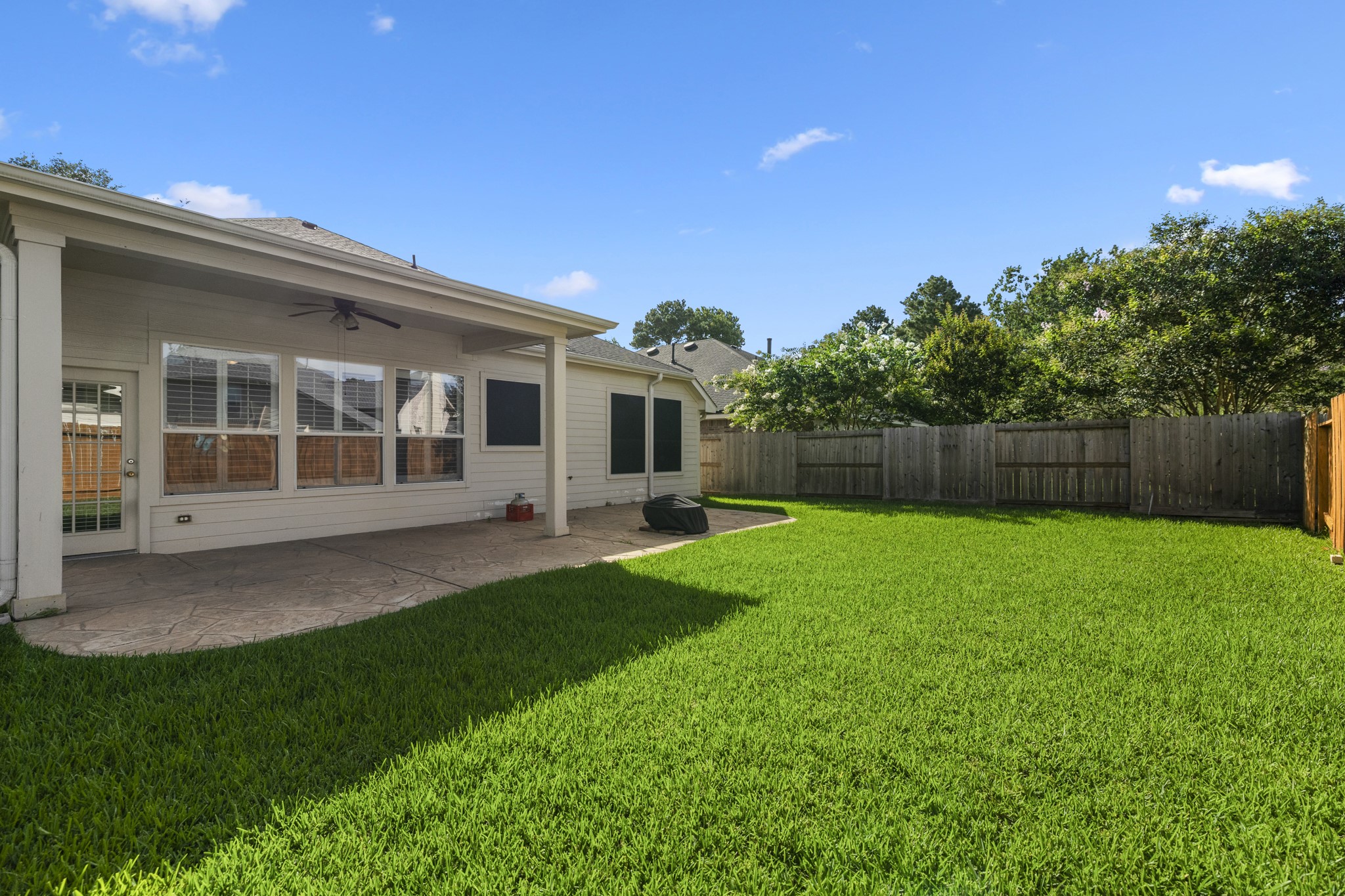20014 Queens Oak Court Spring, TX 77379 - Photo 29 of 49 a view of an house with backyard space and balcony