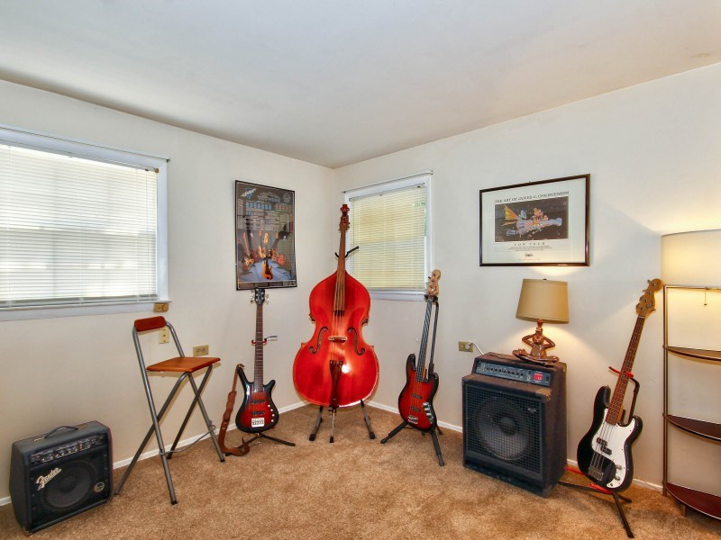 4801 Radcliff Road Raleigh, NC 27609 - Photo 18 of 25 4th bedroom is currently being used as a music room. Bedroom