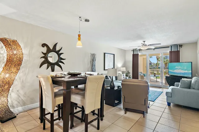 a view of a livingroom with furniture and window