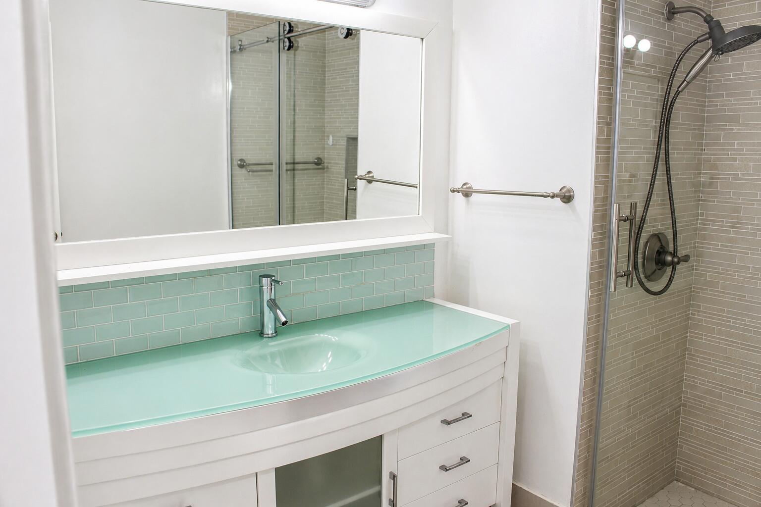 8861 Bella Vista Drive Boca Raton, FL 33433 - Photo 11 of 16 a bathroom with a shower and a sink