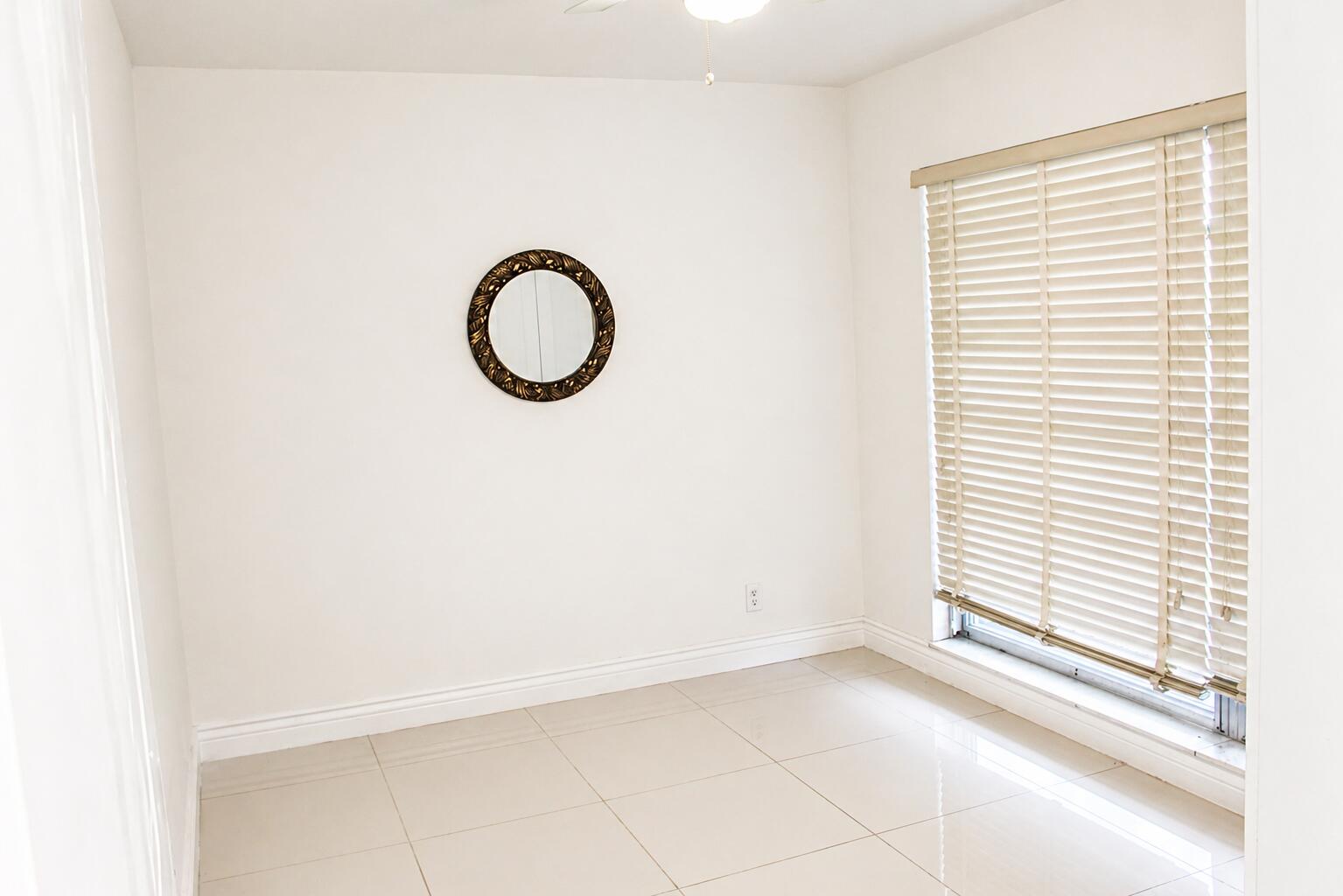 8861 Bella Vista Drive Boca Raton, FL 33433 - Photo 13 of 16 a view of a room that has a window