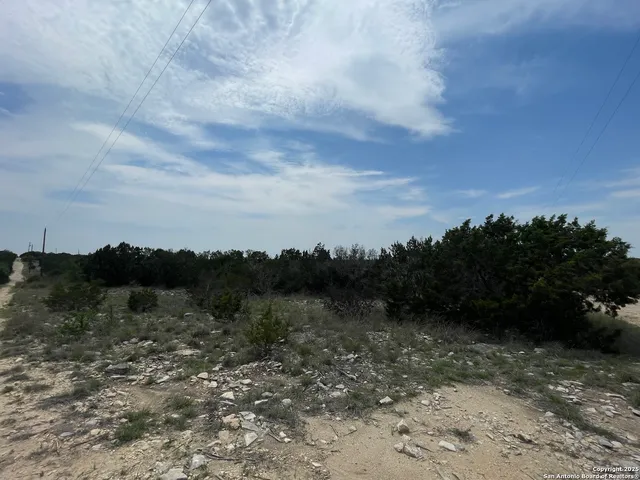 a view of a lake with mountains in the background