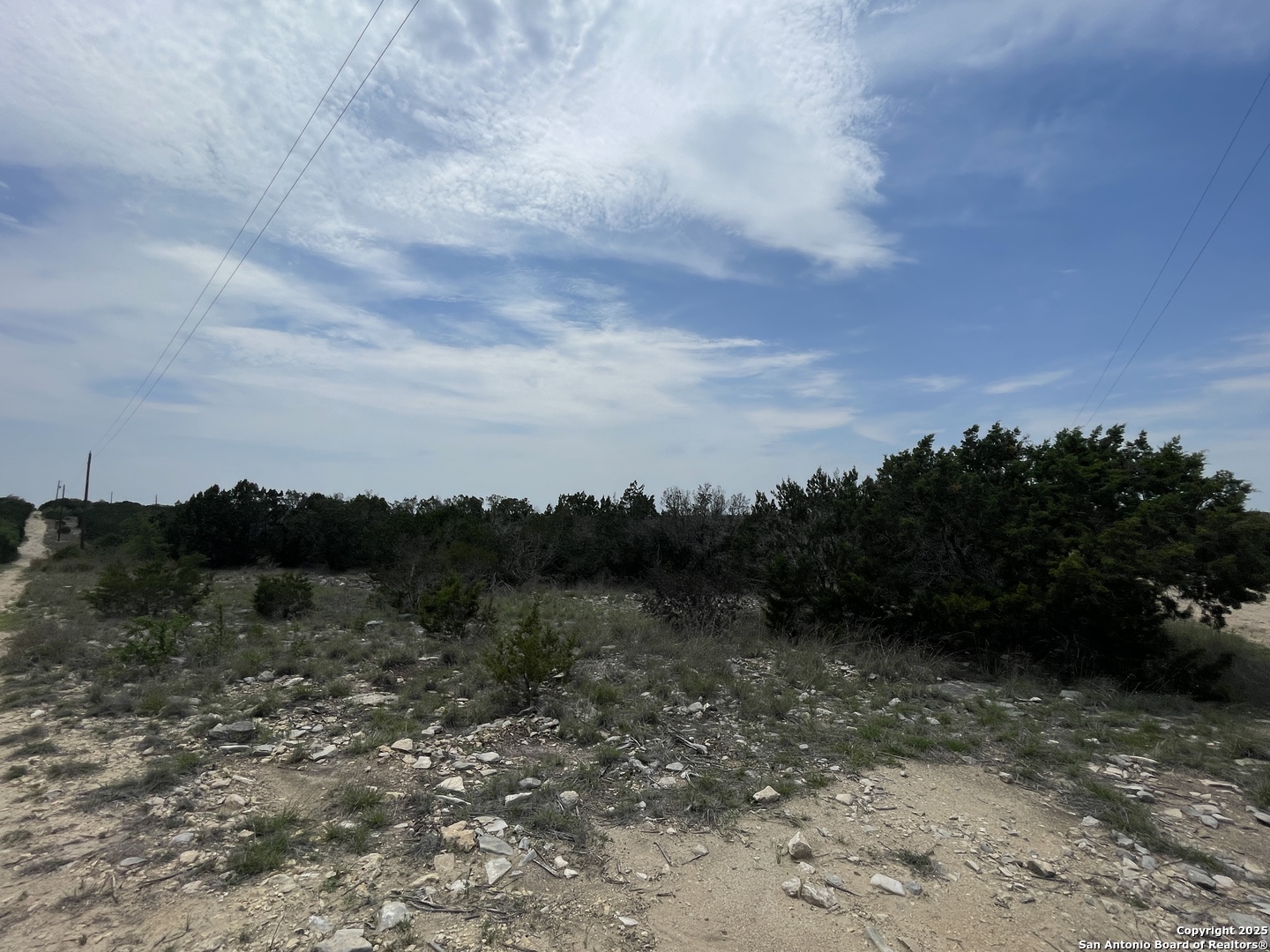 350 SD 23110 Rocksprings, TX 78880 - Photo 3 of 15 a view of a lake with mountains in the background