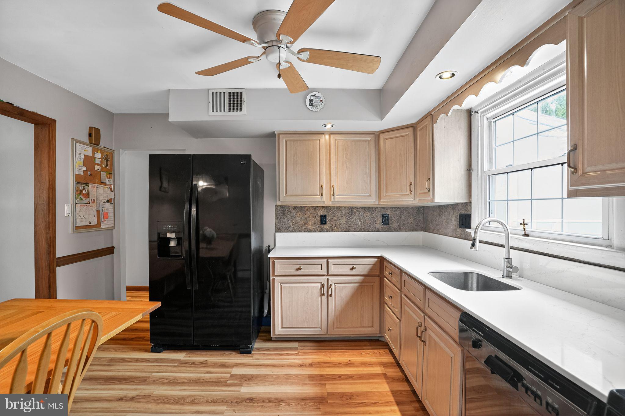 719 Pine Ridge Road Media, PA 19063 - Photo 11 of 29 a kitchen with a sink cabinets and window