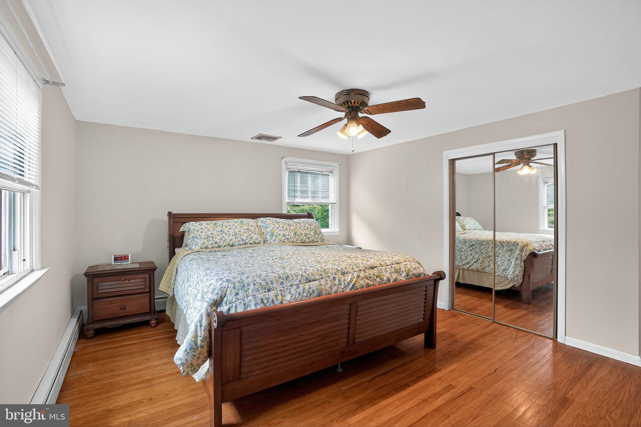 719 Pine Ridge Road Media, PA 19063 - Photo 13 of 29 a bedroom with a bed a window and a chandelier