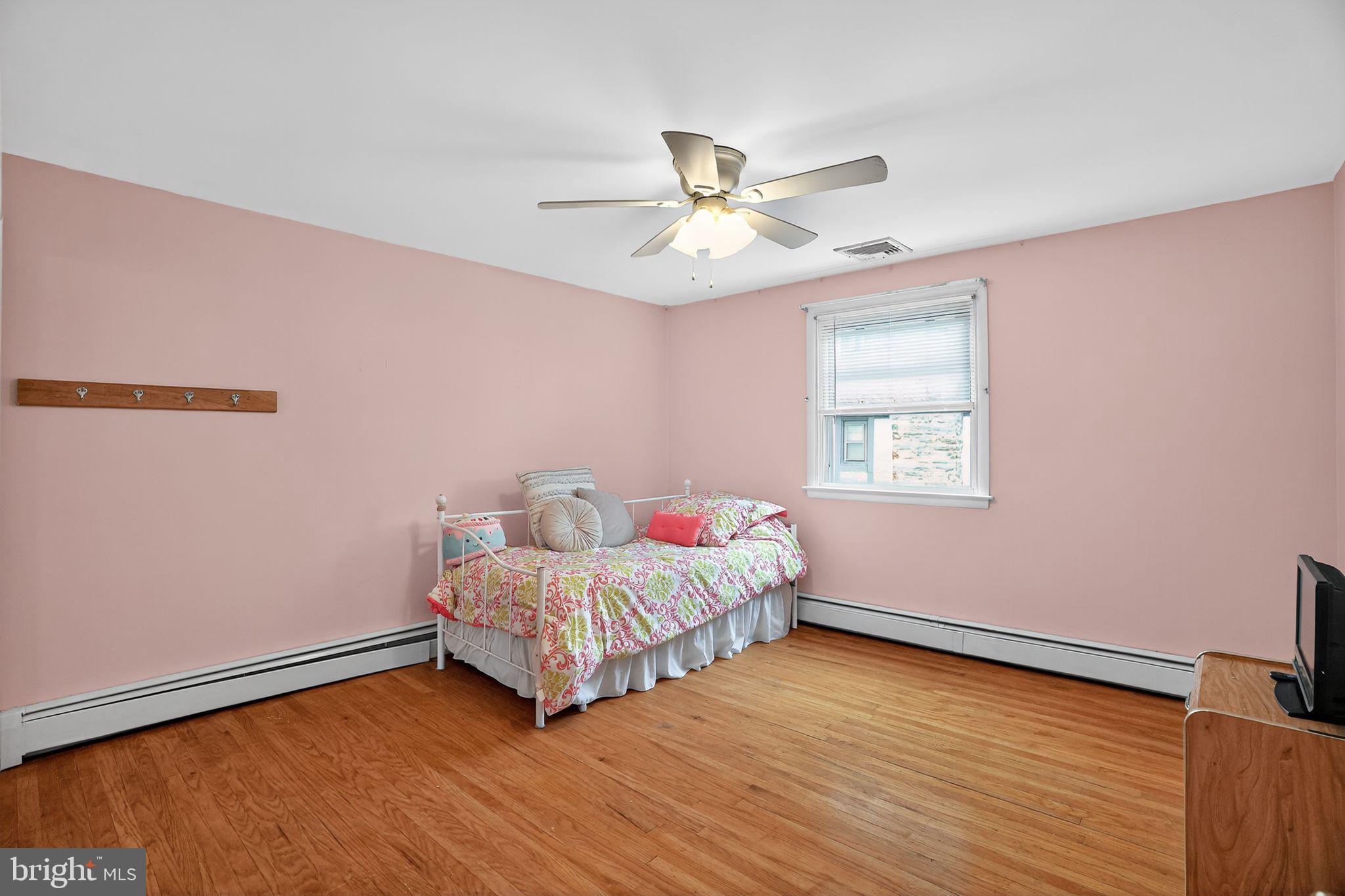 719 Pine Ridge Road Media, PA 19063 - Photo 17 of 29 a bedroom with a bed and a window