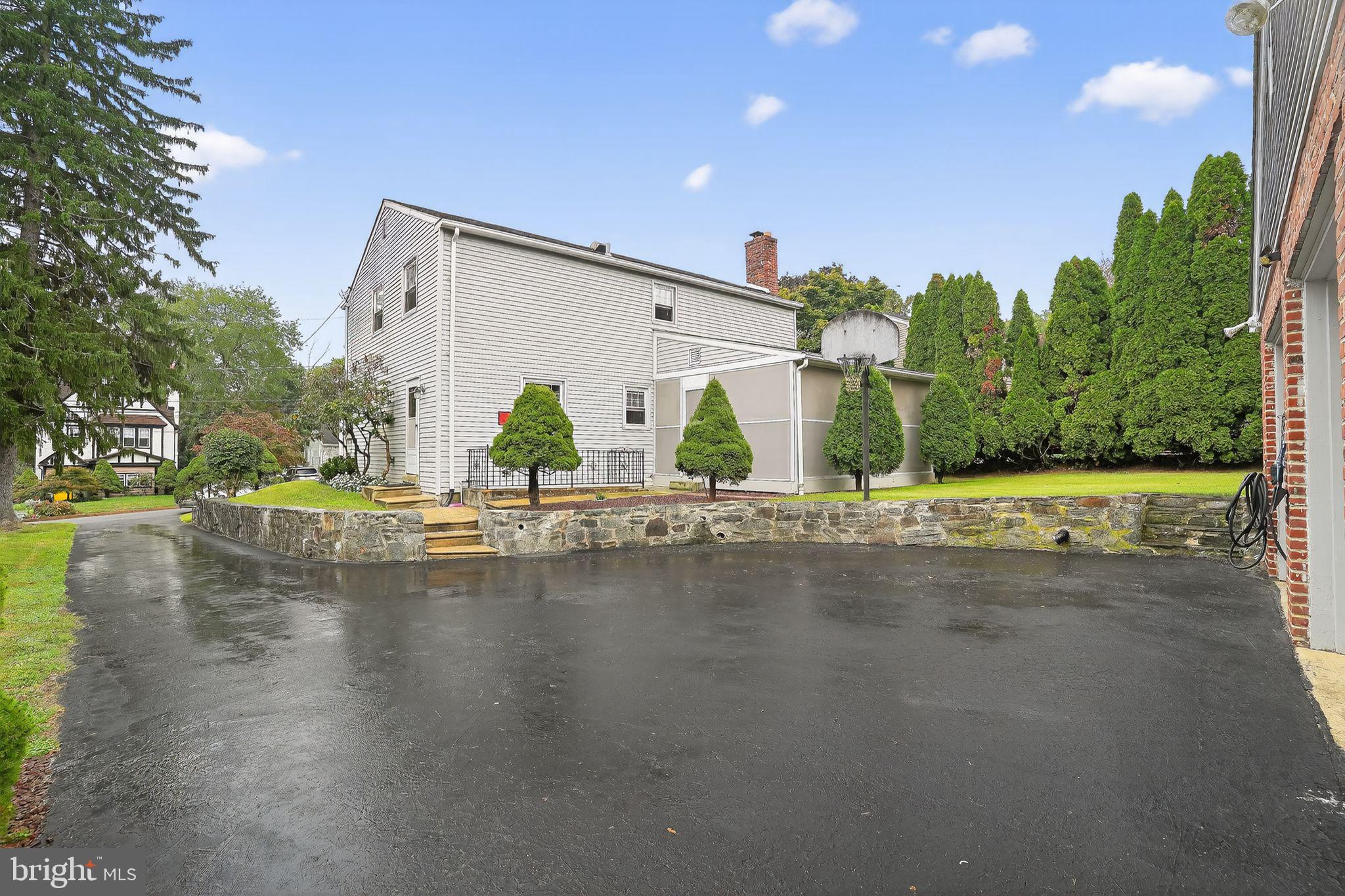 719 Pine Ridge Road Media, PA 19063 - Photo 27 of 29 a view of pool with plants and trees