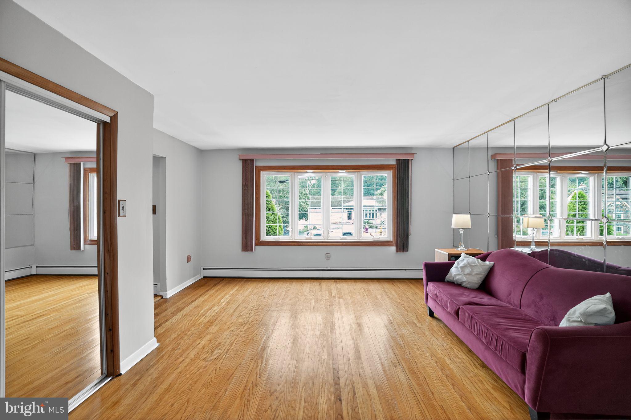 719 Pine Ridge Road Media, PA 19063 - Photo 4 of 29 a living room with furniture and a large window