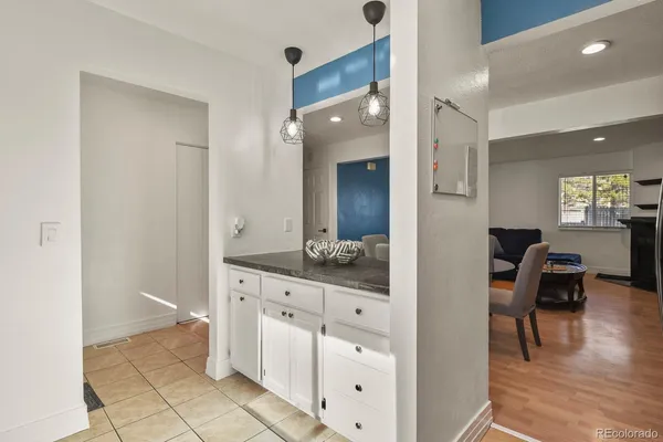 a kitchen with stainless steel appliances granite countertop a sink and cabinets