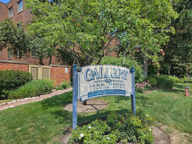 2150 Bouterse Street, Unit 106 Park Ridge, IL 60068 - Photo 2 of 25 a sign on the side of the road