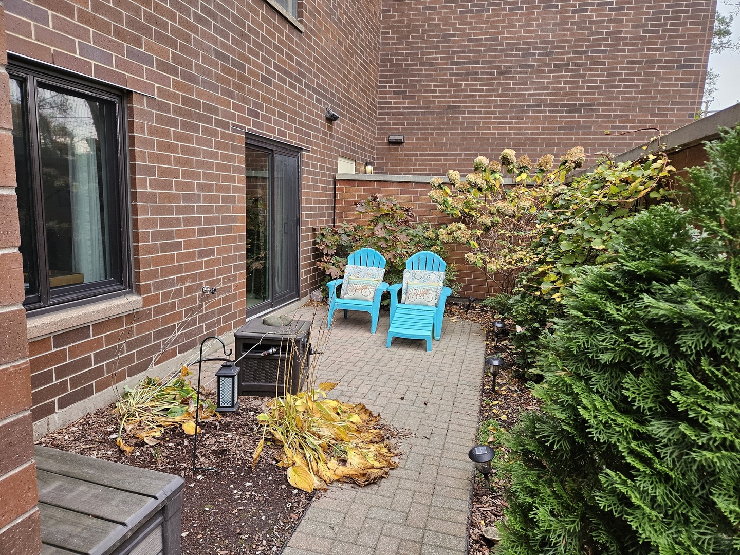 2150 Bouterse Street, Unit 106 Park Ridge, IL 60068 - Photo 24 of 25 a front view of a house with plants