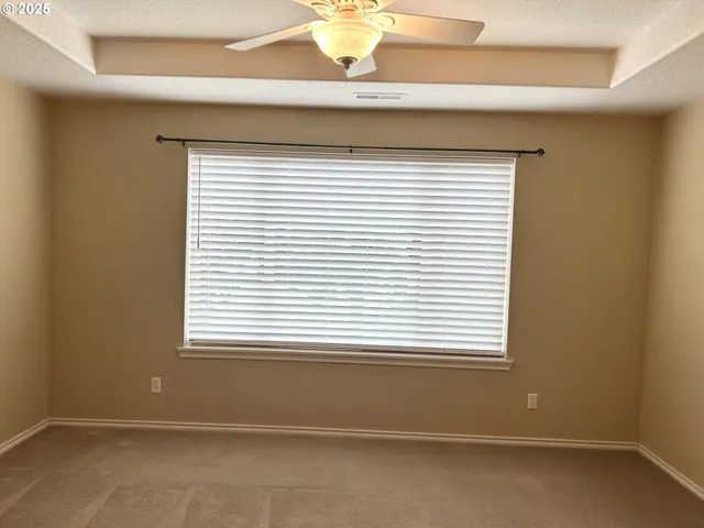 a view of a room that has a window