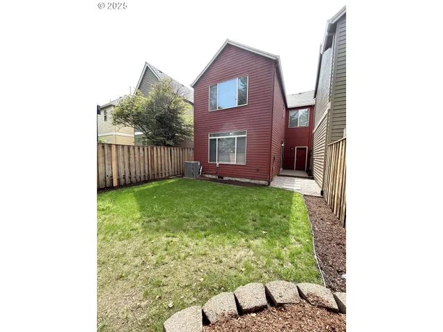 a view of a backyard with garden