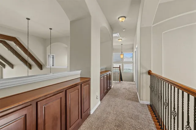 a view of a hallway with a sink