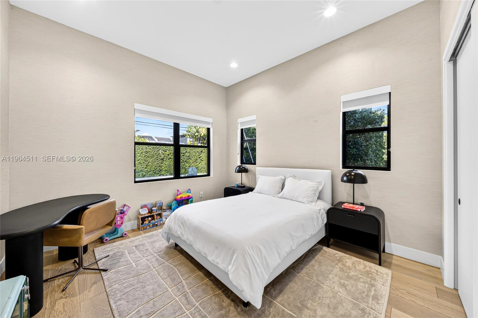 7500 Southwest 55th Avenue Miami, FL 33143 - Photo 21 of 48 a bedroom with a bed and a window