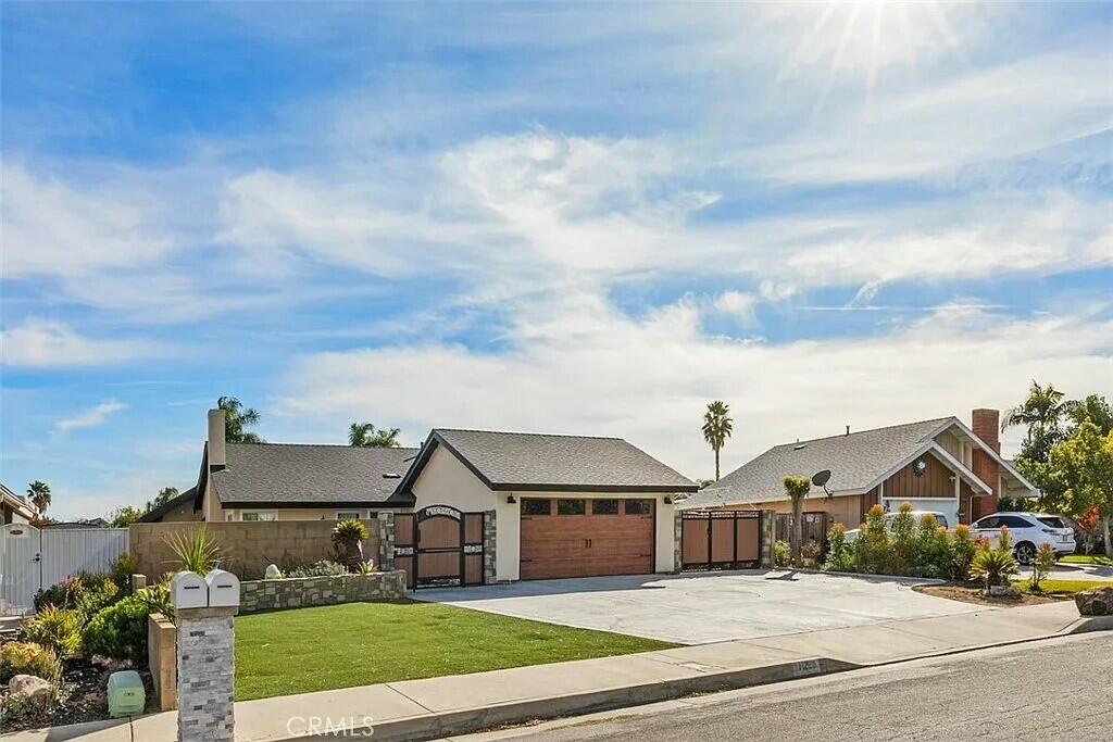 11228 Cameron Drive Riverside, CA 92505 - Photo 2 of 28 a view of house with yard and street view