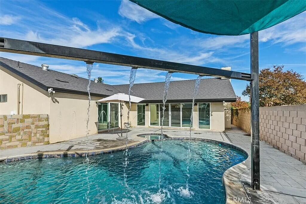 11228 Cameron Drive Riverside, CA 92505 - Photo 24 of 28 a front view of a house with a yard