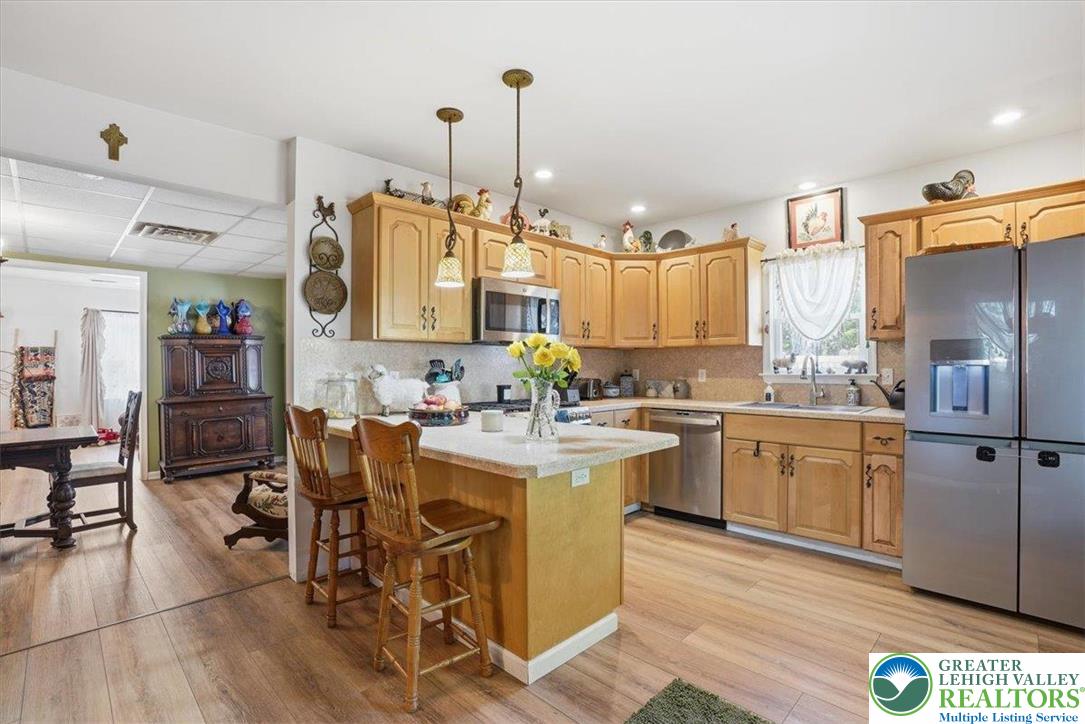 4880 Little Gap Road Kunkletown, PA 18058 - Photo 22 of 100 This spacious kitchen offers a blend of functionality and charm, perfect for daily living and entertaining.