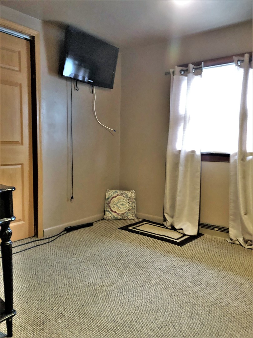 715 Water Street Joliet, IL 60436 - Photo 12 of 21 a view of a room with a mirror