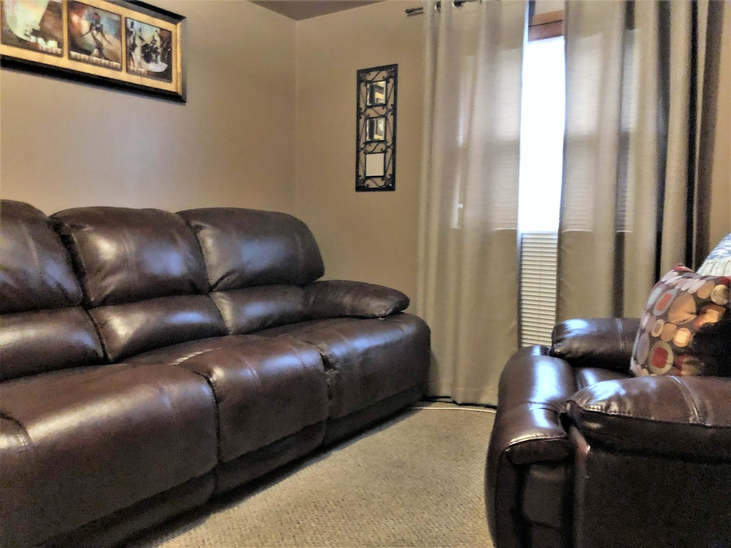 715 Water Street Joliet, IL 60436 - Photo 14 of 21 a living room with a couch