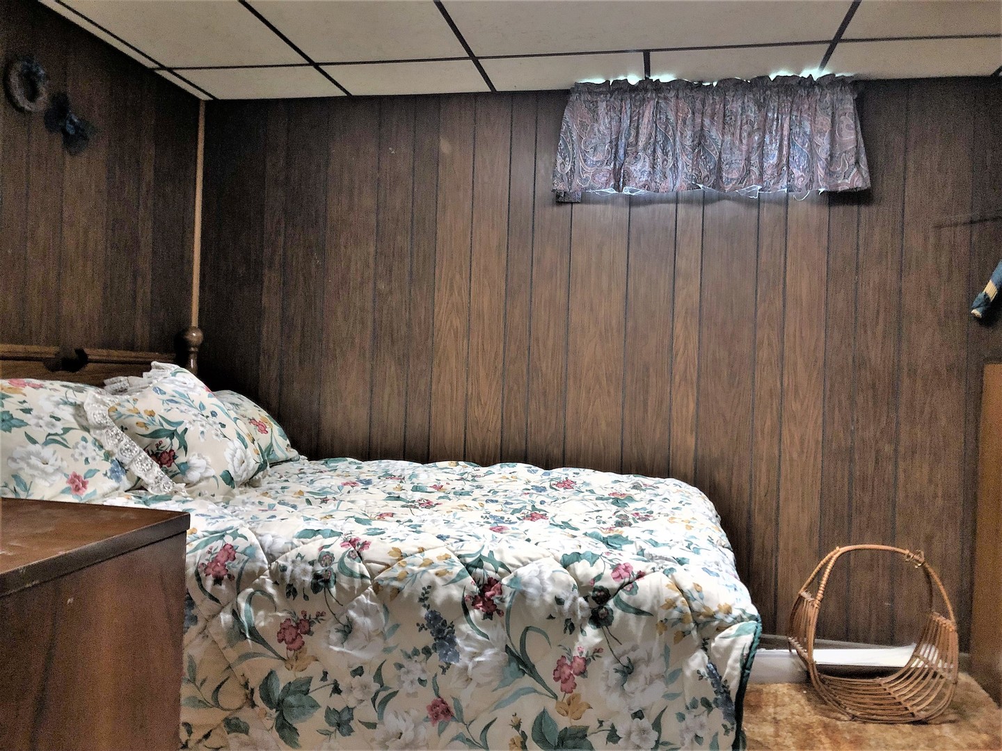 715 Water Street Joliet, IL 60436 - Photo 18 of 21 a bedroom with a bed and a dresser