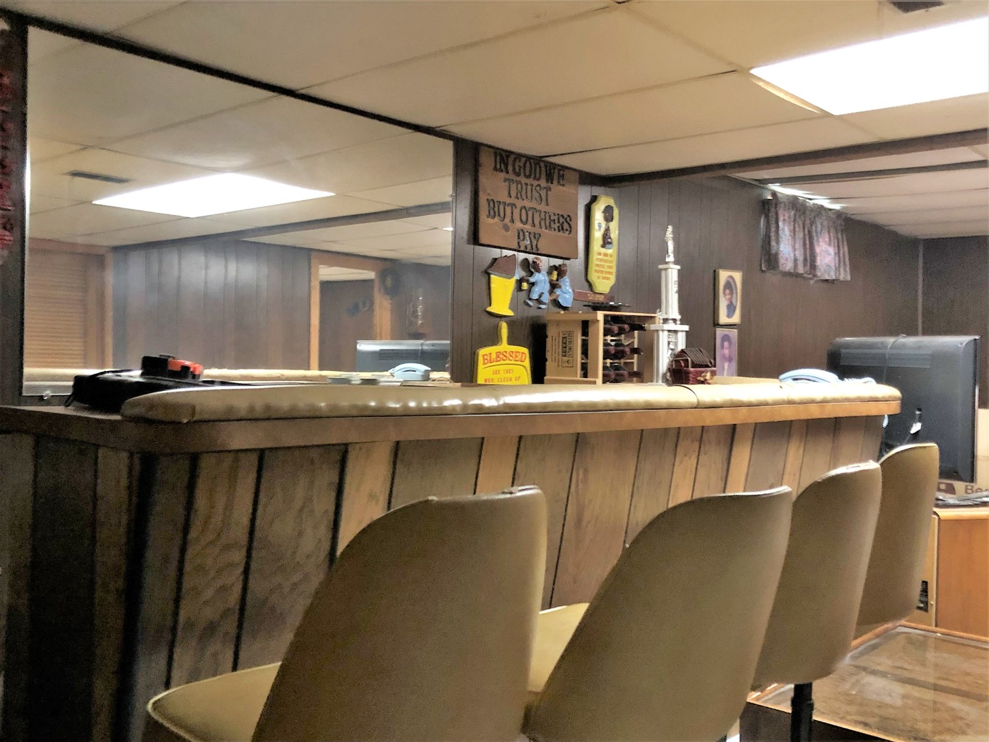 715 Water Street Joliet, IL 60436 - Photo 21 of 21 a kitchen with a table chairs refrigerator and cabinets