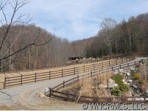 2 Chimney Ridge Clyde, NC 28721 - Photo 6 of 6 a view of a yard with wooden fence
