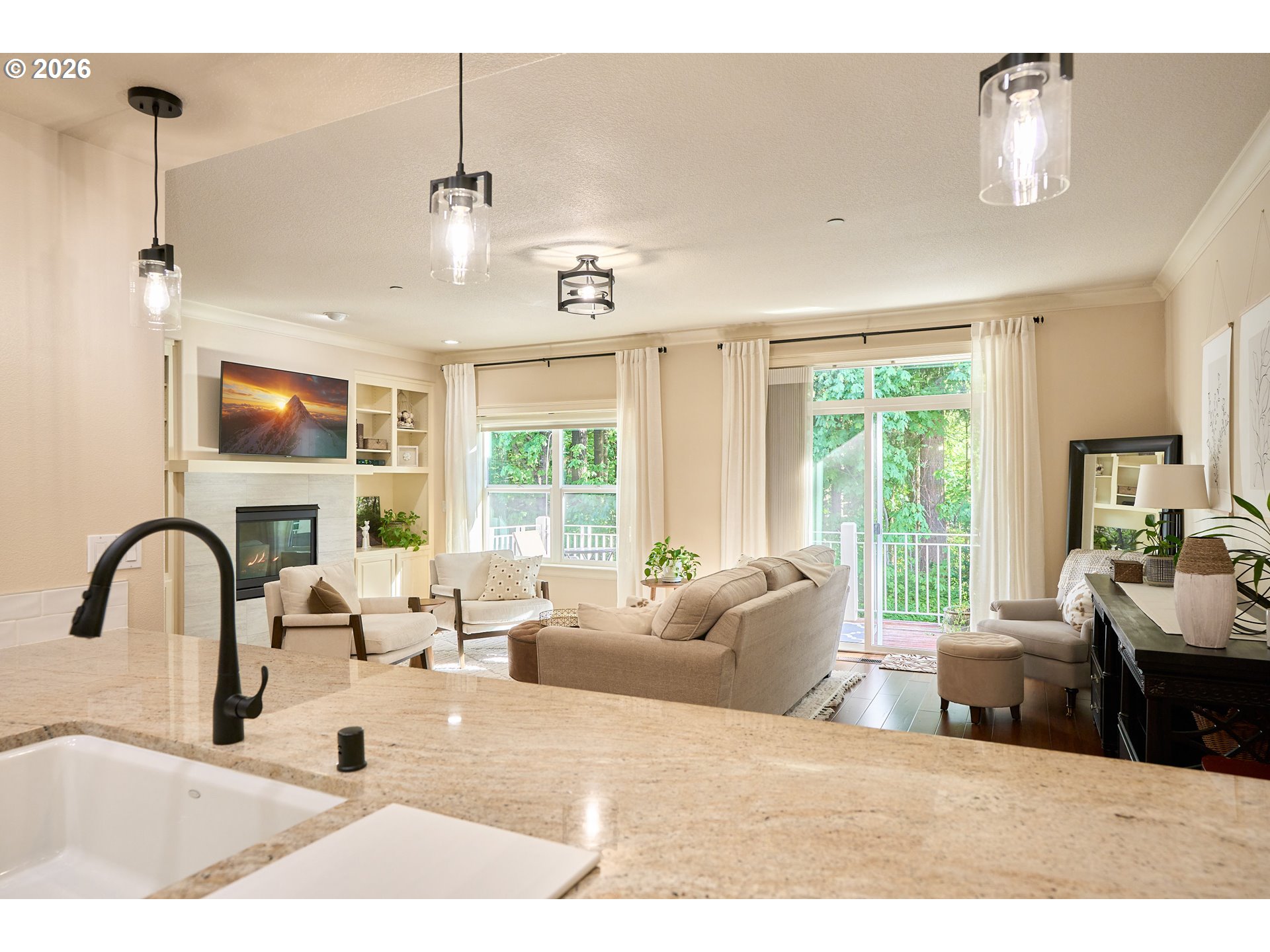 2120 Northwest Fargo Loop Camas, WA 98607 - Photo 17 of 42 a living room with furniture large window and flat screen tv