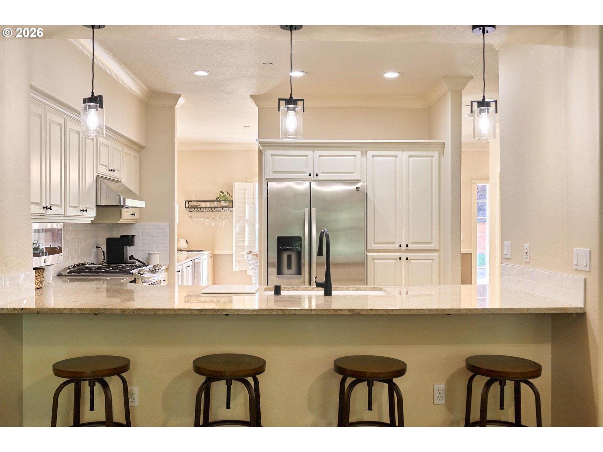 2120 Northwest Fargo Loop Camas, WA 98607 - Photo 19 of 42 a bathroom with a granite countertop sink a mirror and a shower