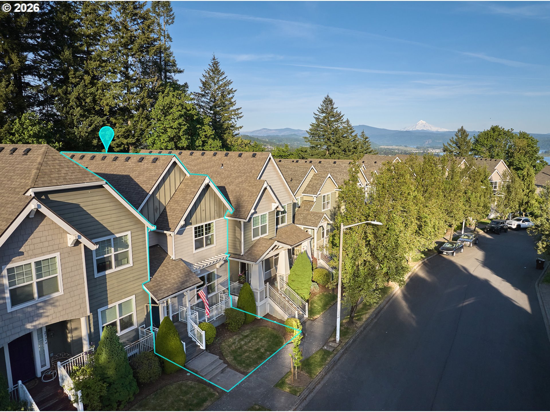 2120 Northwest Fargo Loop Camas, WA 98607 - Photo 2 of 42 a view of a street with potted plants