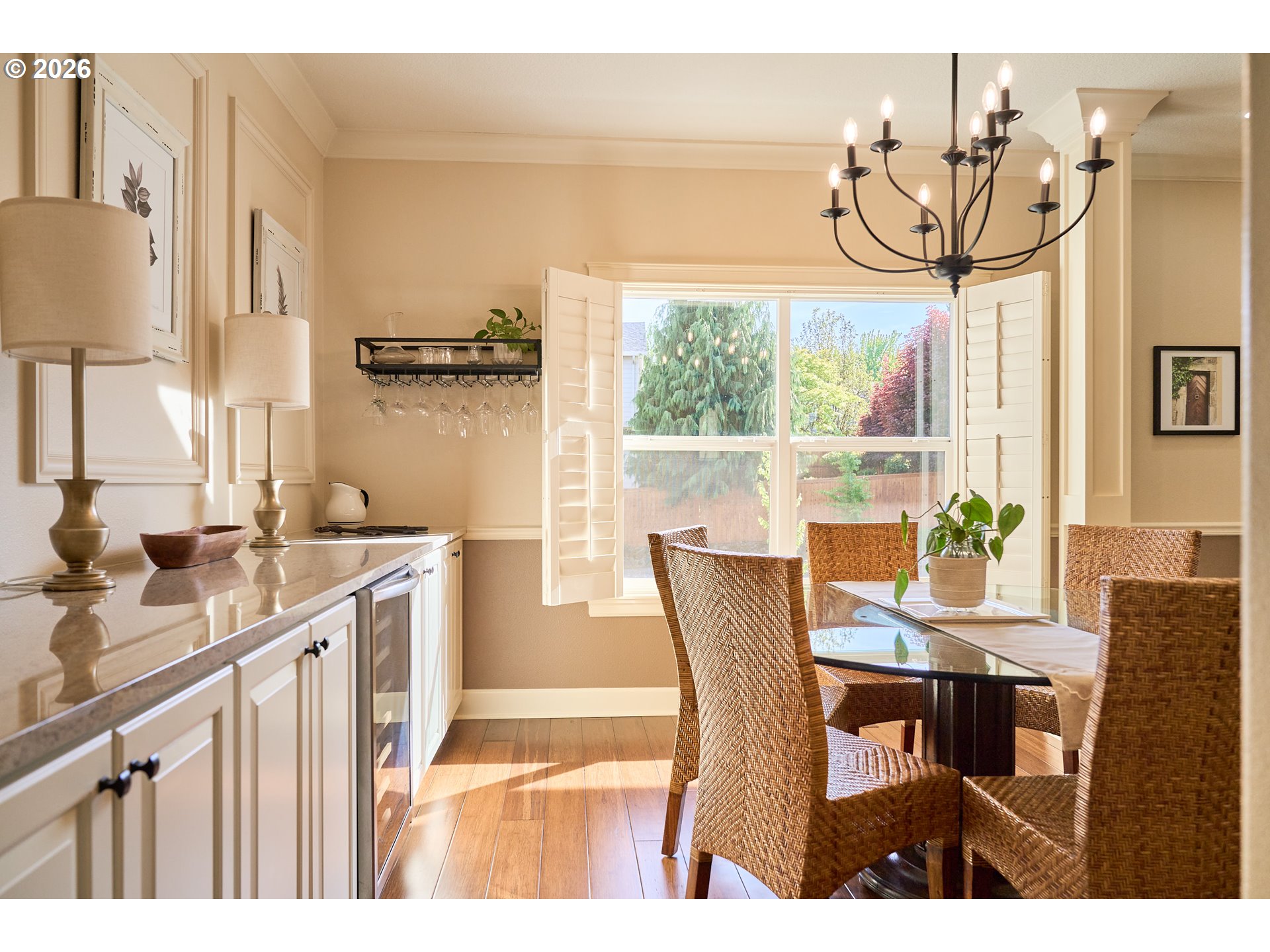 2120 Northwest Fargo Loop Camas, WA 98607 - Photo 24 of 42 a view of a dining room with furniture a chandelier and wooden floor