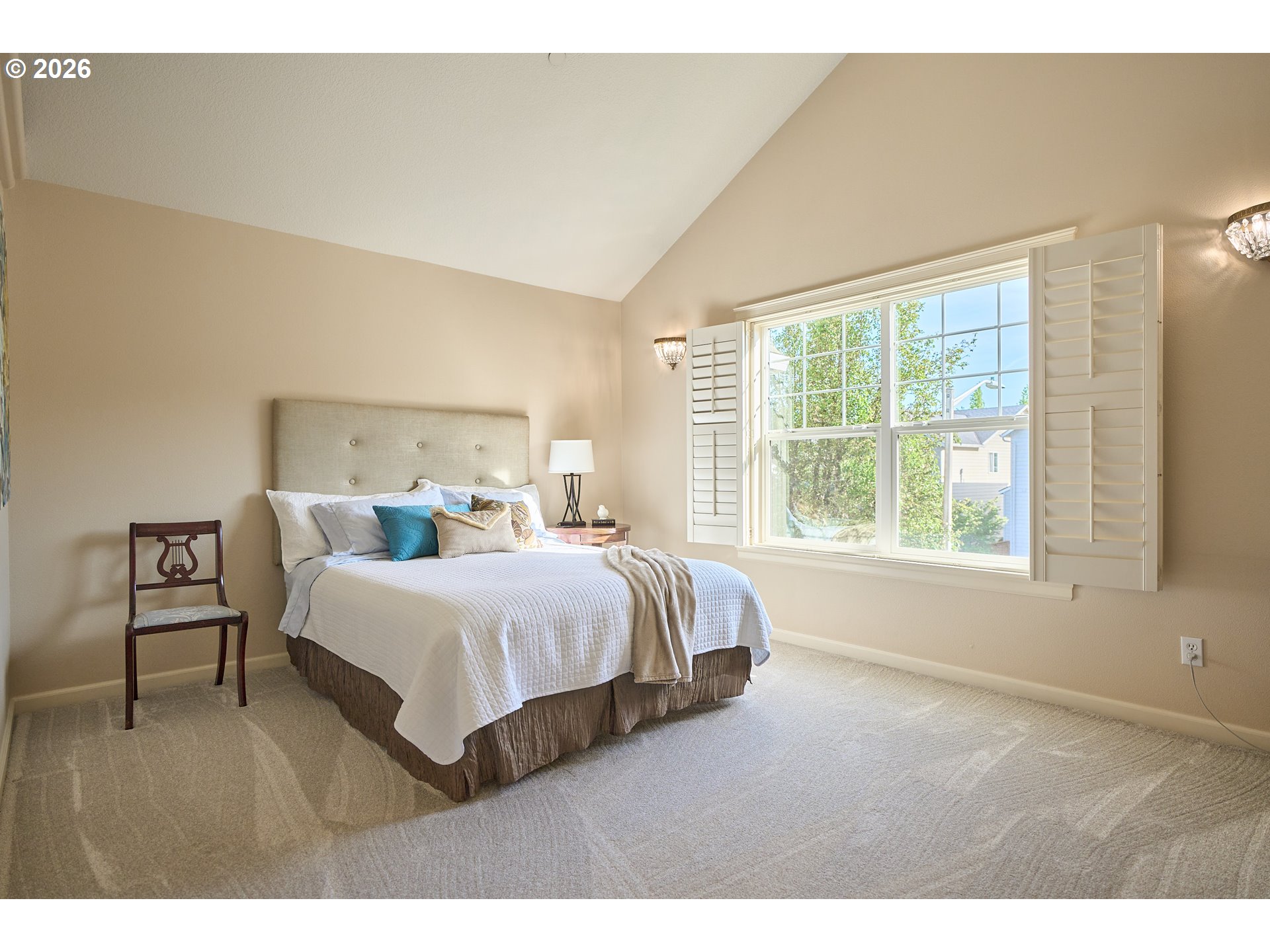 2120 Northwest Fargo Loop Camas, WA 98607 - Photo 36 of 42 a bedroom with a bed and a large window