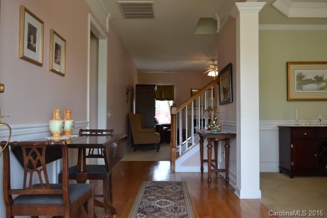 408 Lafinca Court Fort Mill, SC 29708 - Photo 2 of 20 a dining room with furniture and wooden floor