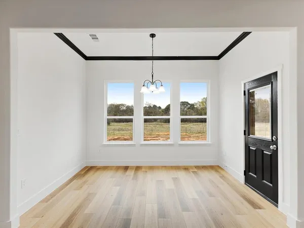 a bathroom with a double vanity sink mirror and shower