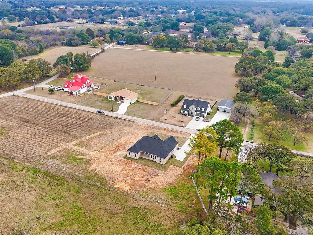 544 Shepherd Road Combine, TX 75159 - Photo 32 of 36 an aerial view of a house with a yard and ocean view